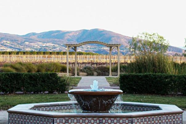 The fountain at Ponte Vineyard Inn with the Temecula Hills in the background