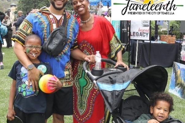 Parents and their children celebrating Juneteenth