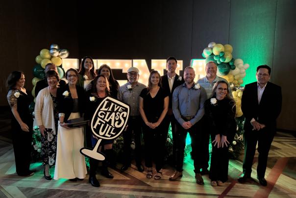 Group photo of Service Winners in formal attire