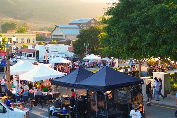 Several vendor tents at the Temecula Sunset Market