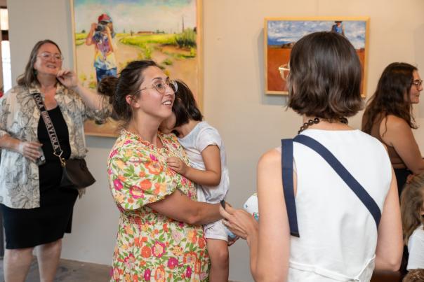 People at art exhibition in Downtown Temple