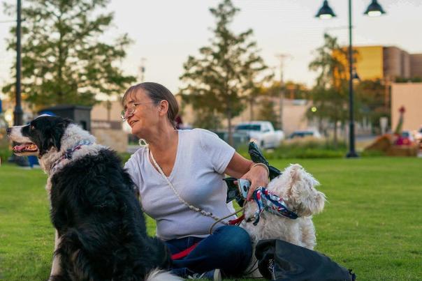 Women and dogs on Santa Fe Plaza