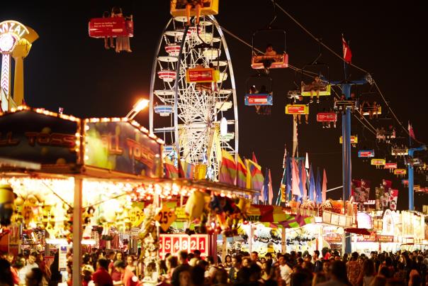 The amusement rides and lights of the Canadian National Exhibition at night