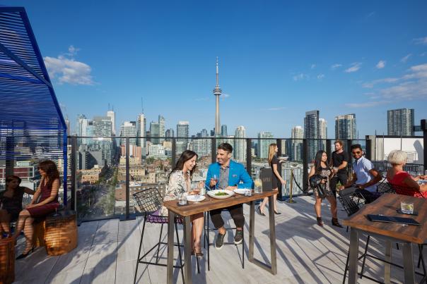 A couple has a meal at Lavelle rooftop
