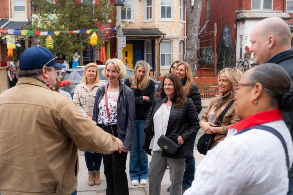 A group of event-planning professional visit Toronto’s Kensington Market.