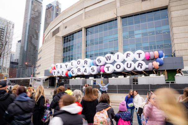 "Taylor Swift The Era's Tour" is spelled out on large friendship bracelet beads in front of the Rogers Centre