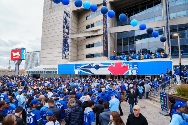 Crowds line up outside Toronto's Rogers Centre for the Blue Jays World Series games