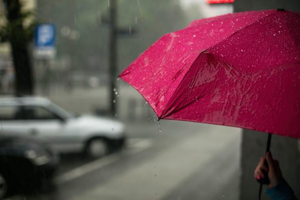 A red umbrella on a rainy day