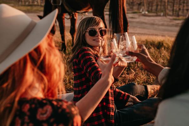 Girls Cheers WIth Paso Wine After a Horseback Ride