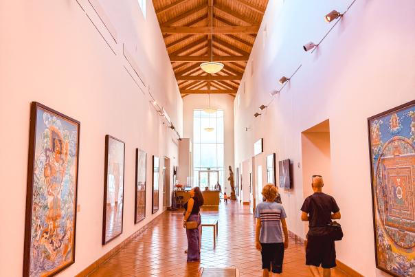 Visitors explore artwork and exhibits inside Bowers Museum in Santa Ana, California.