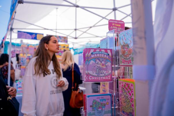 Young woman shopping at the Winter Fourth Ave Street Fair
