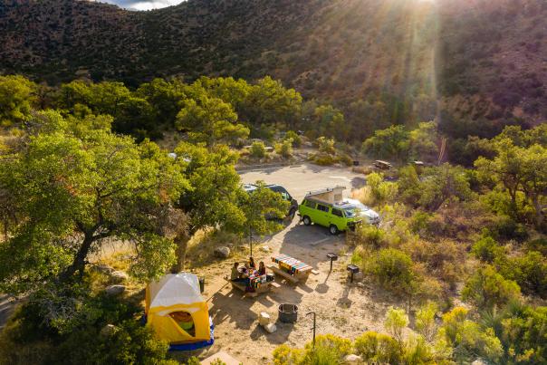 birds-eye view of a group of people sitting at a picnic table at a campground on Mt. Lemmon in Tucson