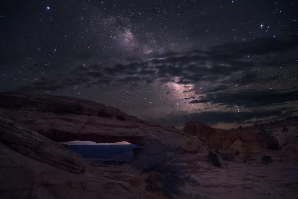The Night Sky seen over the Mesa Arch in Canyonlands National Park