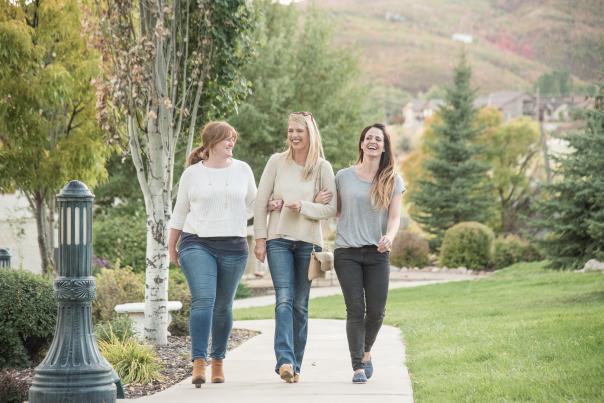 3 happy women walking at Zermatt Resort