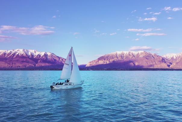 Sailing Boat on Utah Lake with Mountains in Background