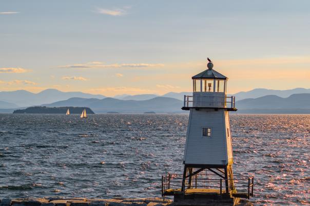An image looking west over Lake Champlain and the Burlington Breakwater - Lighthouse