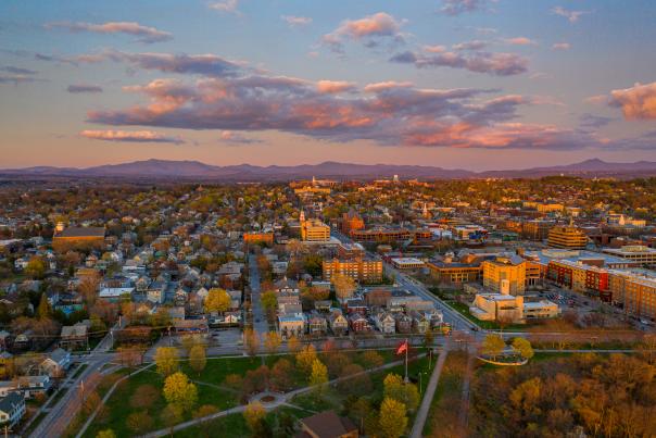 sunset glow over Burlington city and the distant mountains
