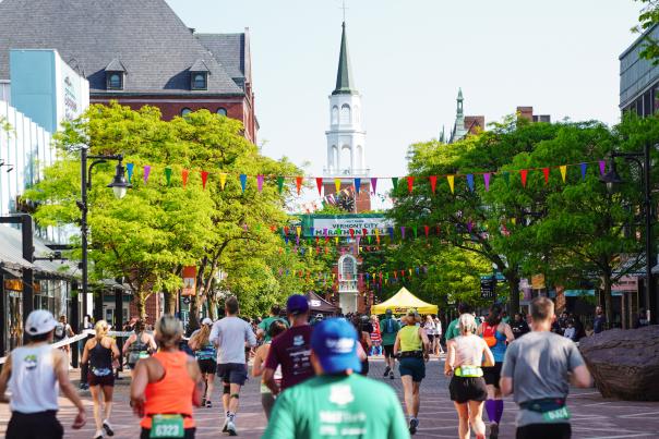 The Vermont City Marathon runners head up Church Street