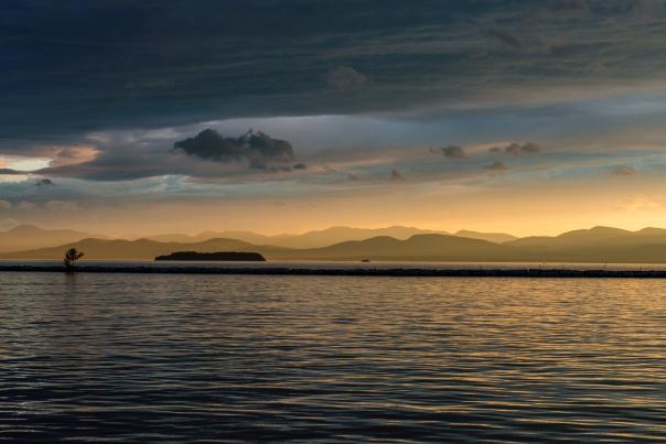 This is a beautiful sunset over looking Lake Champlain along the Burlington Waterfront.