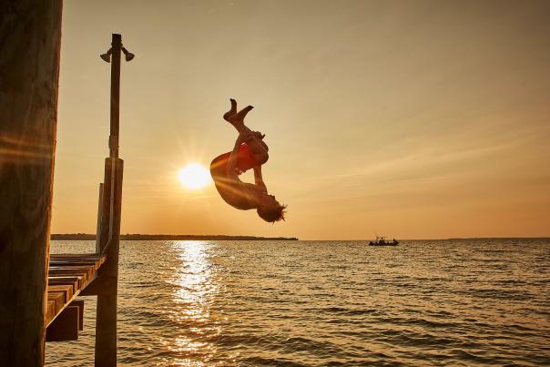 Kid does a backflip off a dock into the Chesapeake Bay