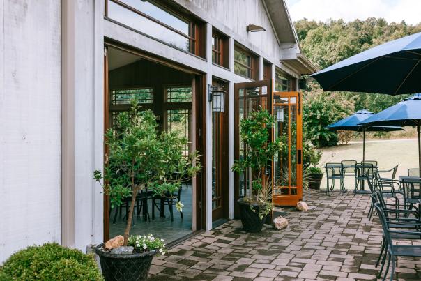 Patio with umbrellas at Albemarle Ciderworks in Charlottesville