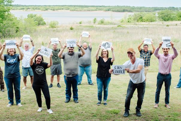 people holding signs