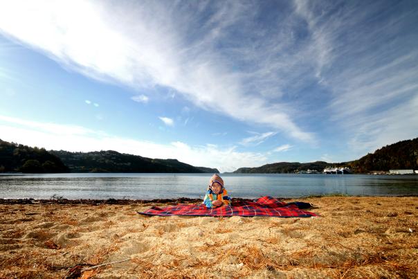 Child on beach at Rosfjord Lyngdal