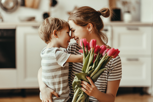 Mother's Day Deals Blog Cover (Mother, Son, and Flowers)
