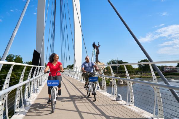 Couple riding bikes at the Keeper