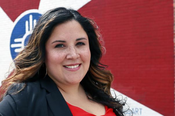 Marisa Pechanec in front of Wichita flag