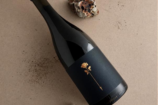 A bottle of Rose & Arrow Estate 2023 Touchstone Pinot noir.