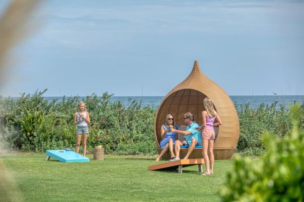 Family Enjoying Oceanfront Activities at the Blockade Runner Beach Resort
