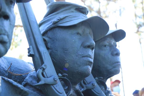 Close up shot of the bronze sculpture commemorating the USCT at Cameron Art Museum.