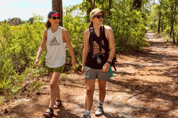 Two women hiking in Carolina Beach State Park