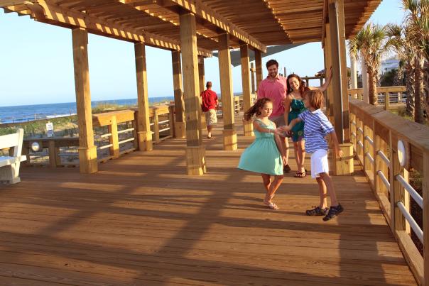 Family on boardwalk