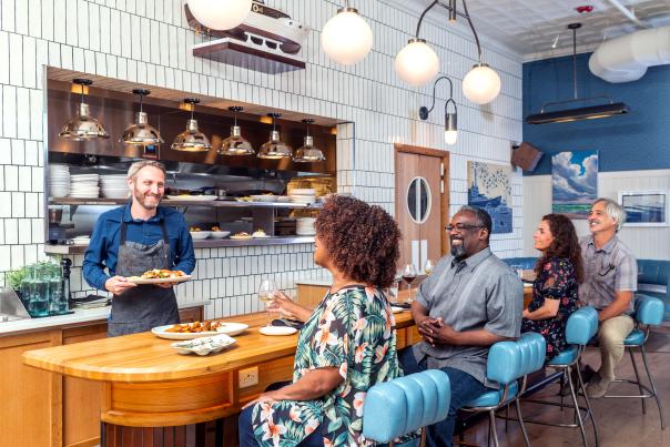 Group dining inside Seabird Restaurant in Wilmington, N.C.