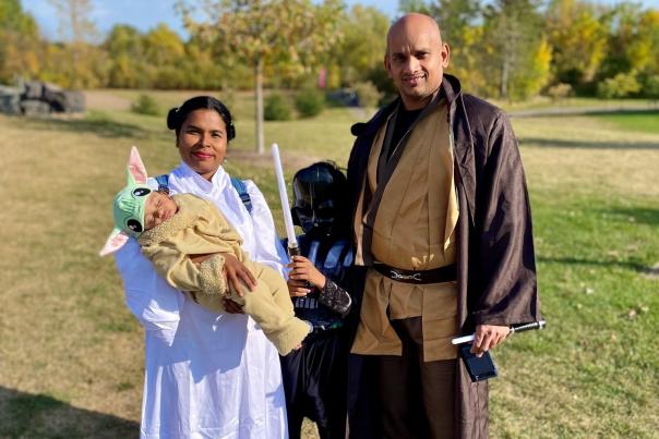 Family dressed up for Halloween at Woodbury community event.