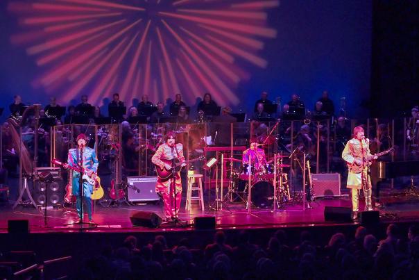 The Beatles Tribute Band and Houston Symphony performing at The Cynthia Woods Mitchell Pavilion