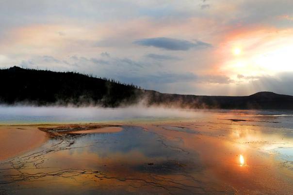 sunset over Yellowstone's hydrothermal features.
