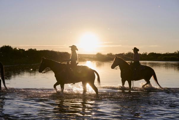 Thoman women on horses