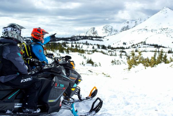 This image contains information related to snowmobiling opportunities and activities in the Snowy Range area of Albany County, including trails, access points, and general recreational details.