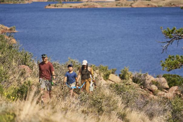 Family enjoying a hike at Curt Gowdy State Park.