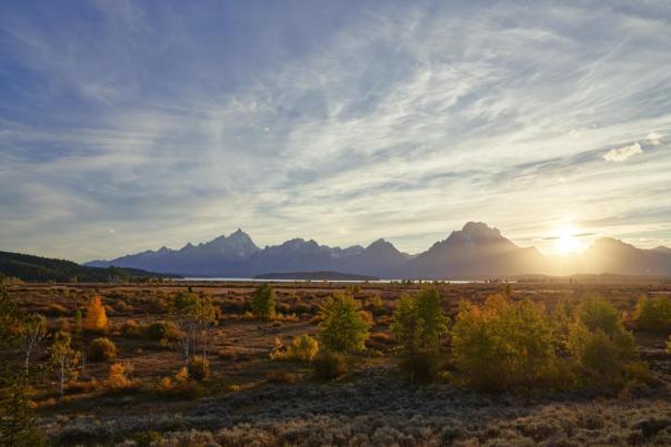 Majestic wyoming mountains under a colorful sky.