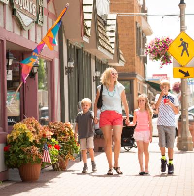 family walking downtown