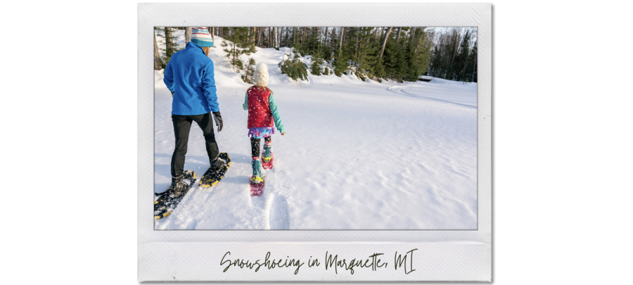 Mother and daughter snowshoeing in Marquette, MI