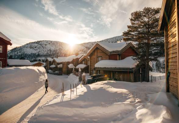 Holiday houses at Hovden in winter landscape and sun shine. Photo