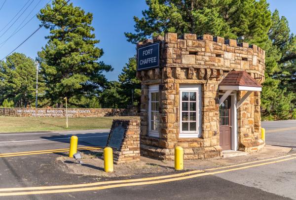 The entrance to Fort Chaffee is made of beautiful stone masonry and has a historic plaque marker.
