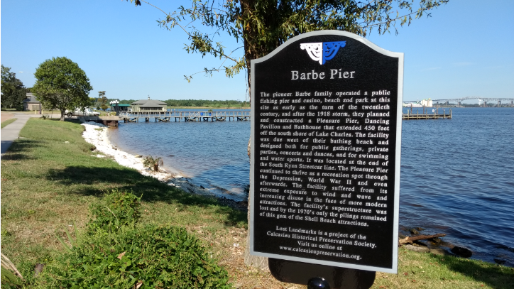 land marker describing the history of barbe pier overlooking the lakefront