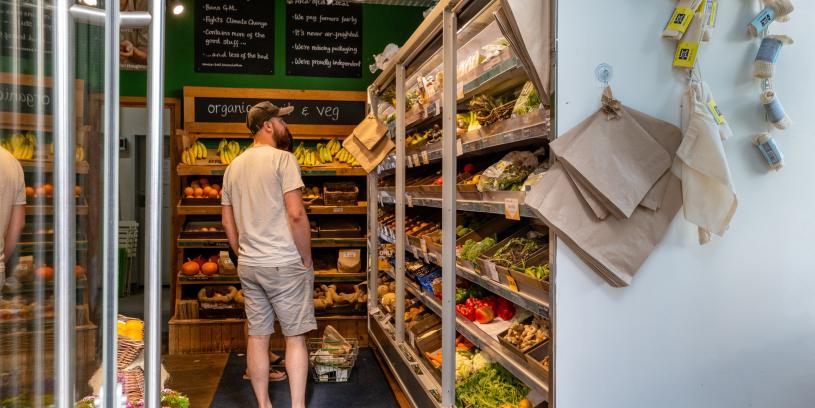 A man browsing the store at Better Food, Wapping Wharf on Bristol's Harbourside - credit Hey What