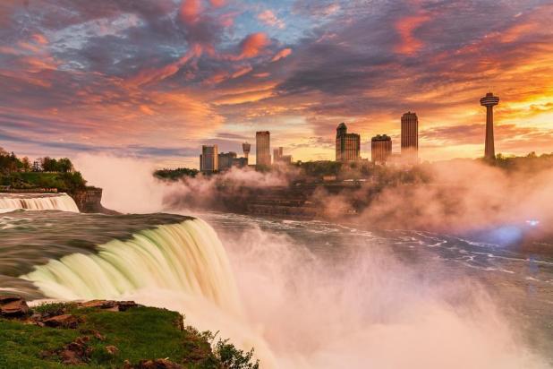 Waters races down Niagara Falls at sunset